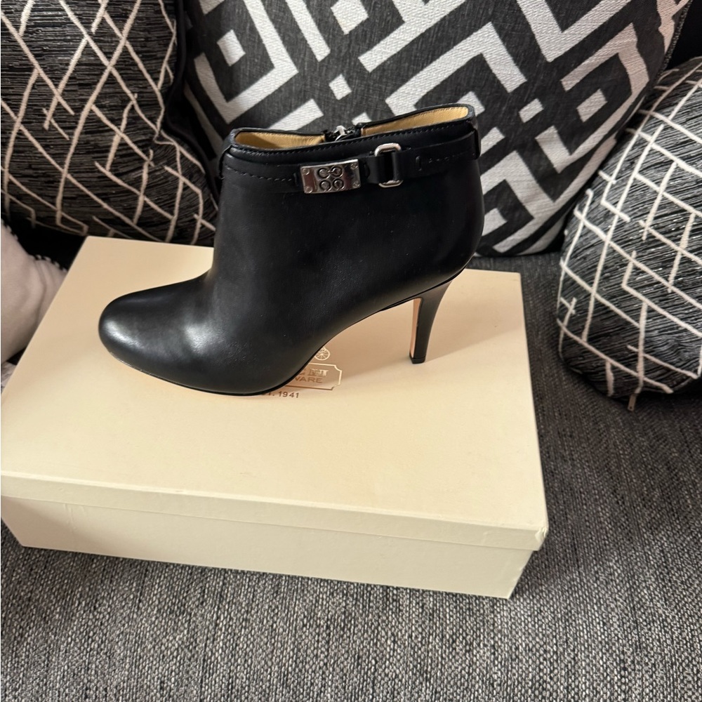 Brand new in box Coach high heel black leather boots.